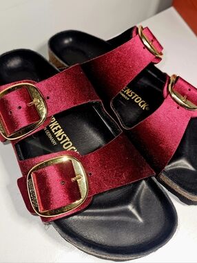 New Arizona Birkenstock Velvet Two-Strap Slides in Burgundy with Gold Buckles.